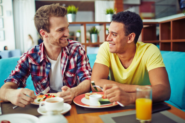 what is prep hiv. Two men eating and looking at each other